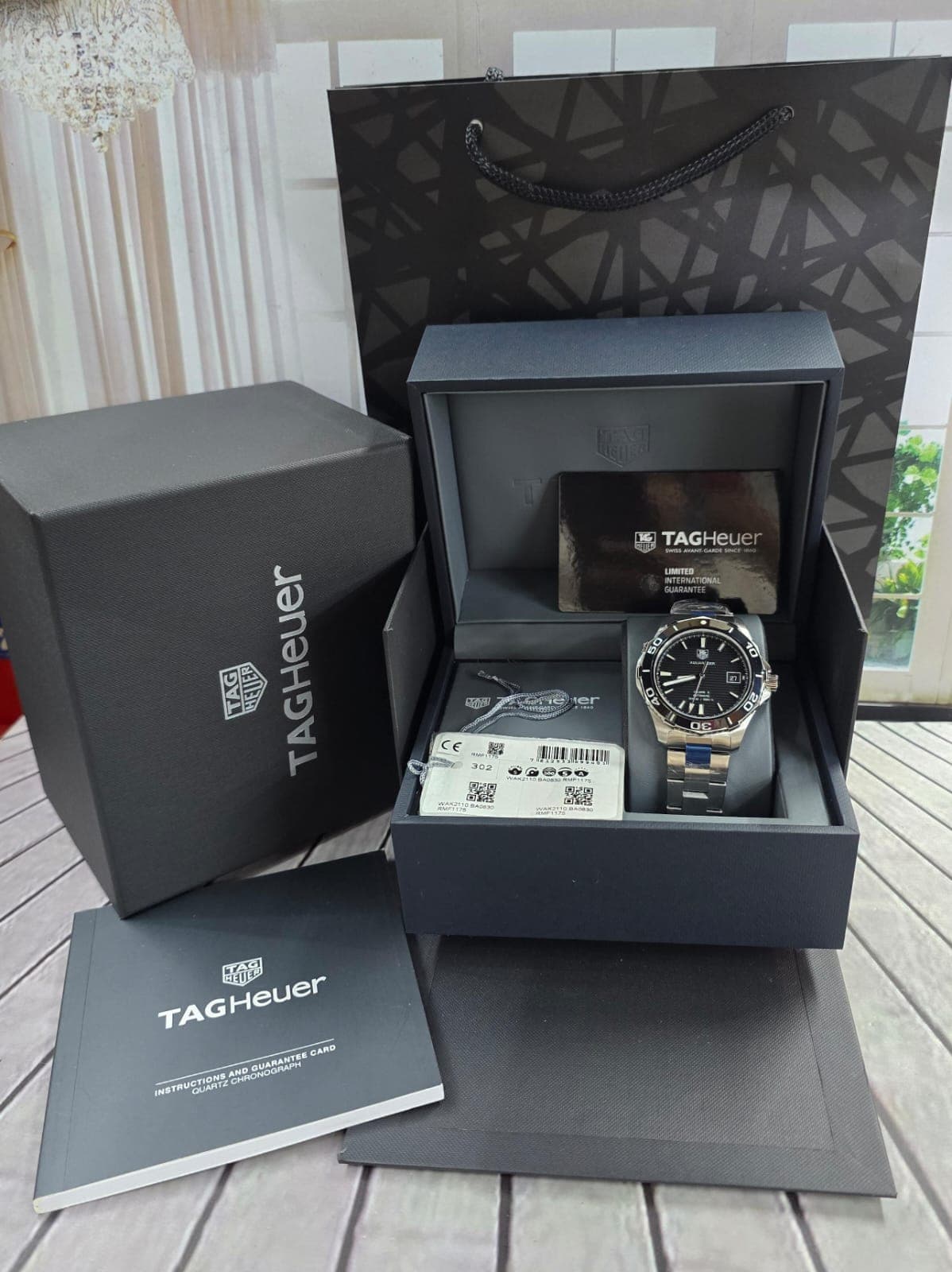 Gambar dari Tag Heuer Aquaracer WAK2110.BA0830 Calibre 5 Automatic Ceramic Black Dial